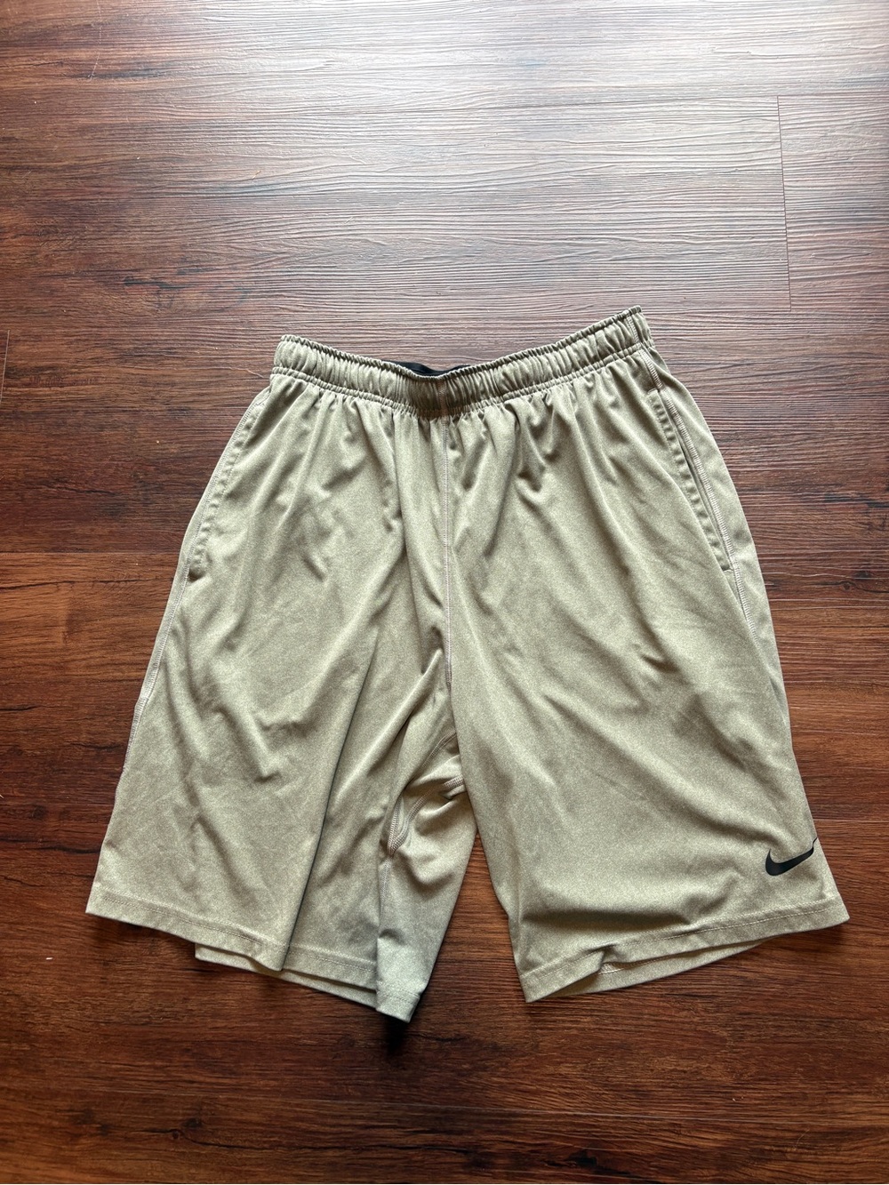 Nike Men's Gray Athletic Shorts with Black Swoosh